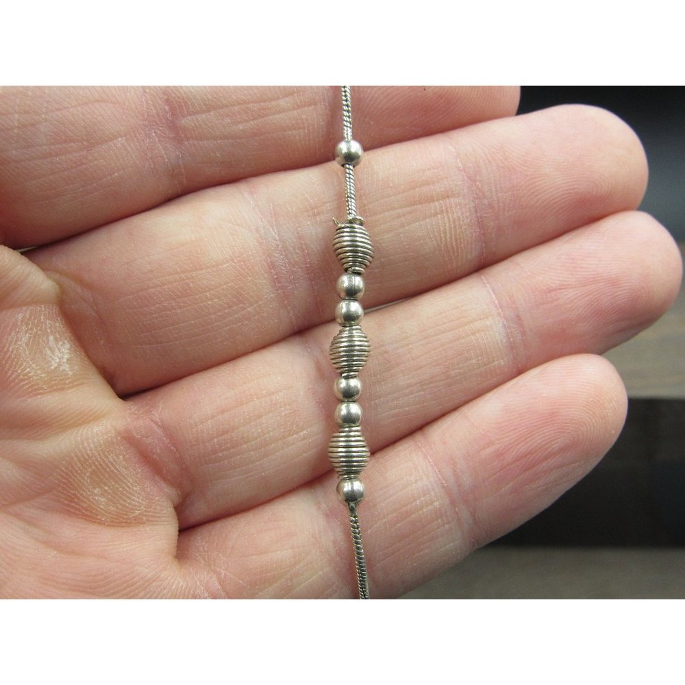 7 Inch Sterling Silver Cool Orb And Braided Charms Chain Bracelet